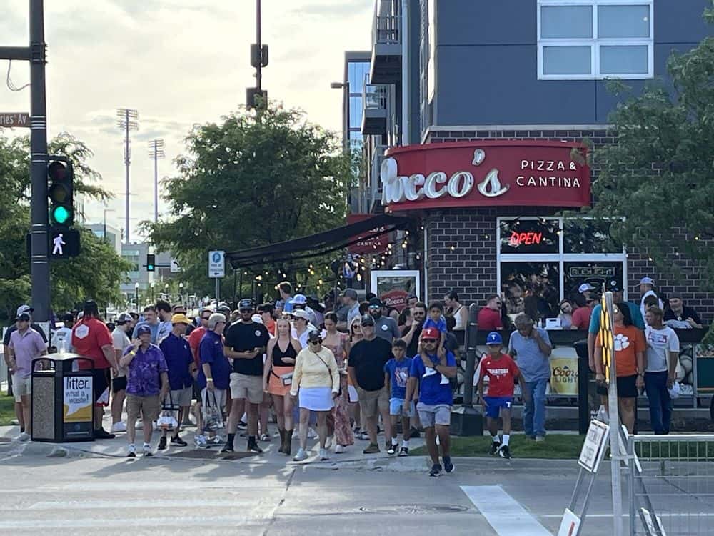 Rocco's Pizza & Cantina exterior packed with people as sports bar in Omaha, NE