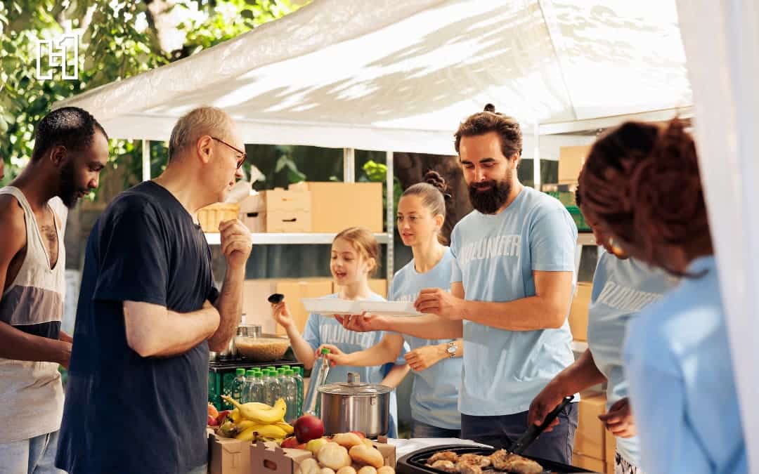 Volunteers helping serve food to those in need.